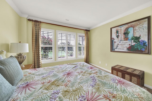 bedroom with crown molding