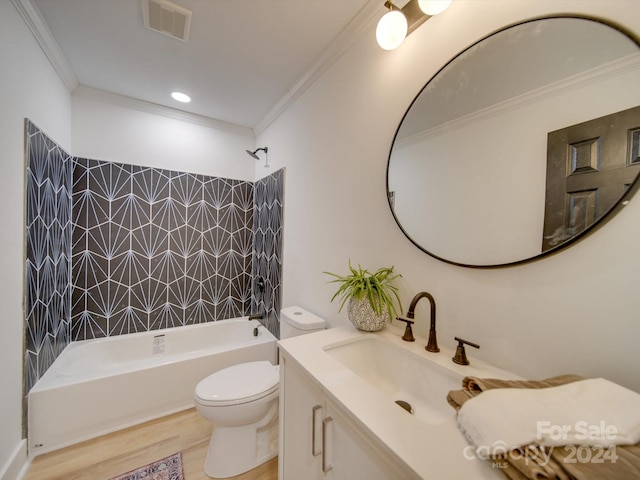 full bathroom with hardwood / wood-style floors, shower / bathtub combination, toilet, and ornamental molding