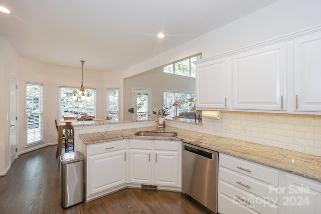 kitchen featuring dishwasher, sink, dark hardwood / wood-style flooring, and white cabinetry