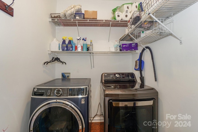 laundry area with washer and clothes dryer