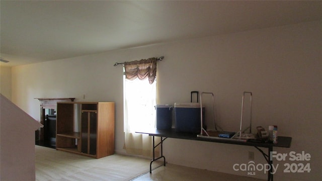 home office featuring light colored carpet