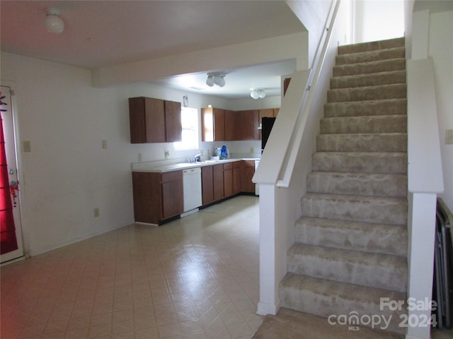 stairs featuring sink