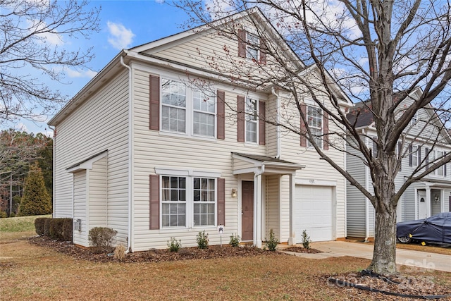 view of front of home featuring a garage and driveway