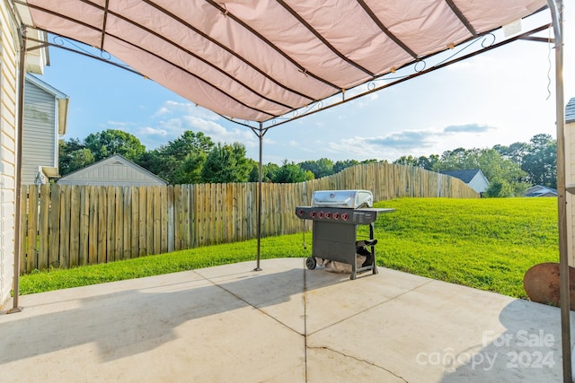 view of patio / terrace with a pergola and grilling area