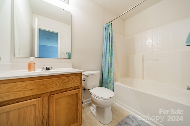 full bath featuring shower / bath combination with curtain, tile patterned flooring, vanity, and toilet