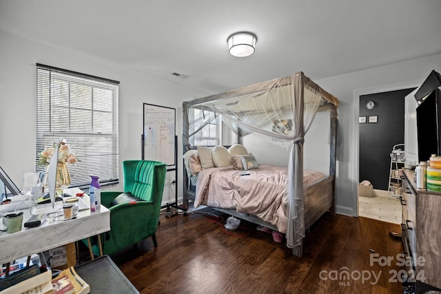 bedroom featuring dark hardwood / wood-style floors