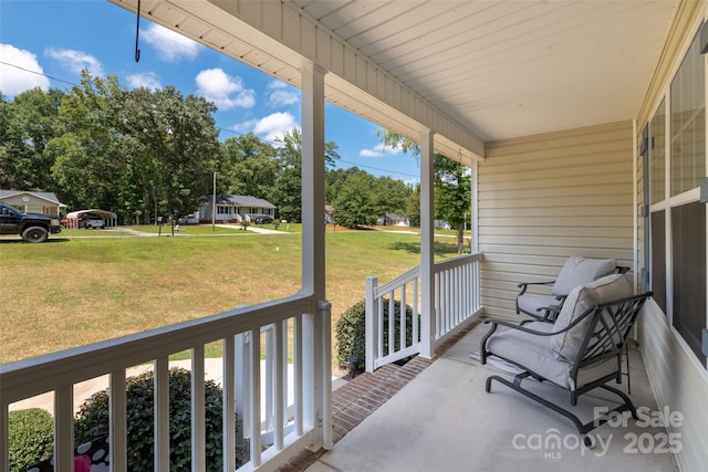 balcony featuring a porch