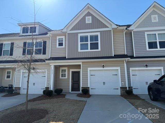 view of property with driveway