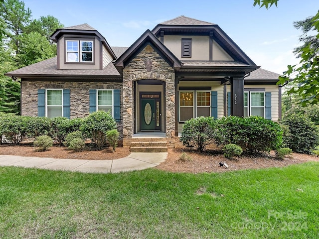 view of front of home with a front yard