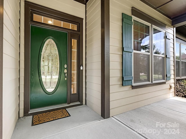 entrance to property with a porch