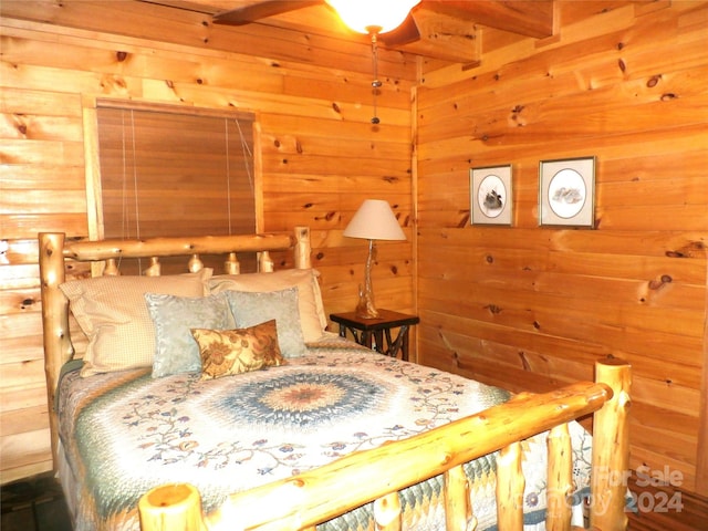 bedroom featuring beam ceiling