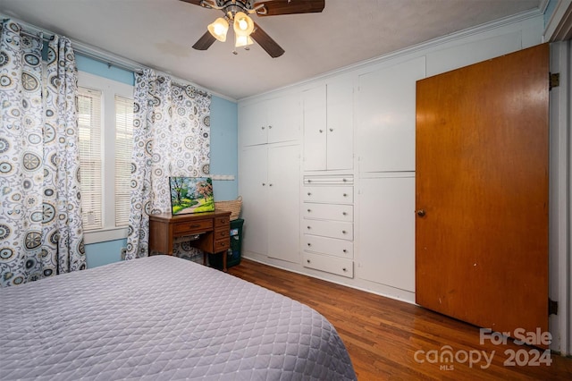 bedroom featuring ceiling fan and wood finished floors