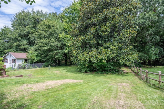 view of yard with fence