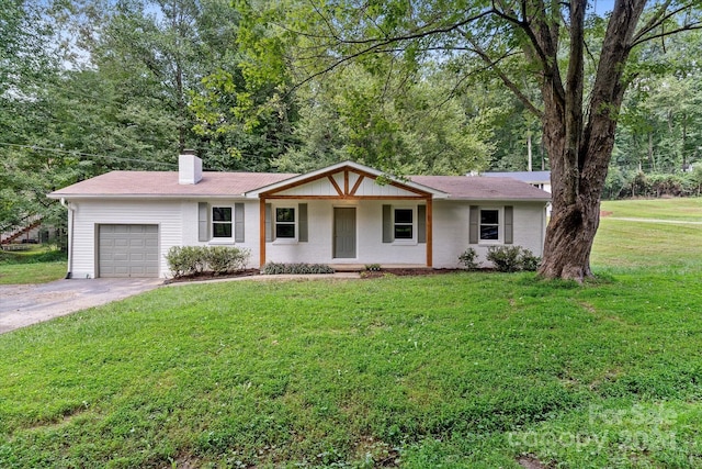 single story home with a front lawn and a garage