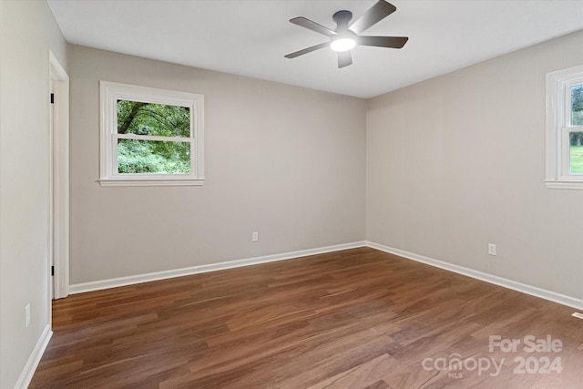 spare room featuring ceiling fan and hardwood / wood-style flooring