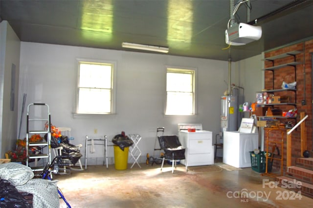 garage with washer and clothes dryer and a garage door opener