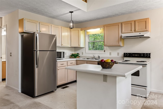 kitchen with a center island, sink, light brown cabinets, stainless steel appliances, and light colored carpet