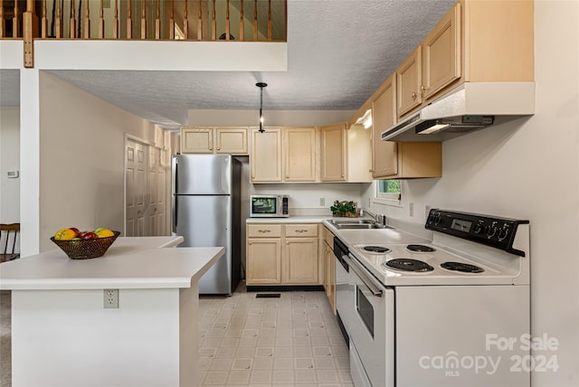 kitchen featuring appliances with stainless steel finishes, sink, a textured ceiling, light brown cabinetry, and light tile patterned flooring