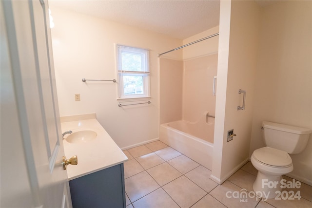 bathroom with bathtub / shower combination, toilet, vanity, a textured ceiling, and tile patterned flooring