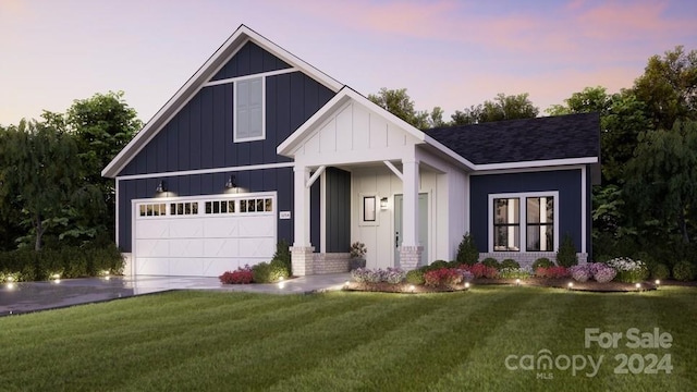 view of front of home with a yard