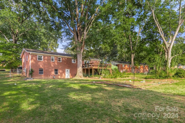 view of yard featuring a deck