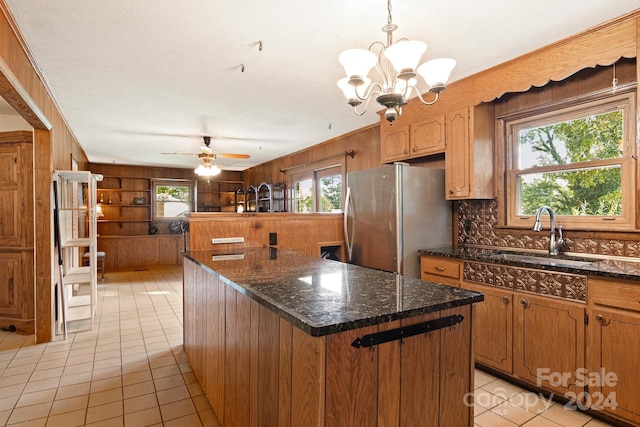 1573 Timberlake Dr, Shelby, NC 28150 - kitchen featuring a sink, plenty of natural light, a center island, and freestanding refrigerator