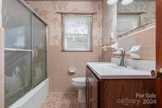 1573 Timberlake Dr, Shelby, NC 28150 - full bath featuring wallpapered walls, toilet, vanity, and a wainscoted wall
