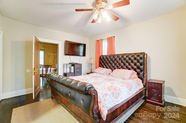 bedroom featuring ceiling fan and dark hardwood / wood-style floors