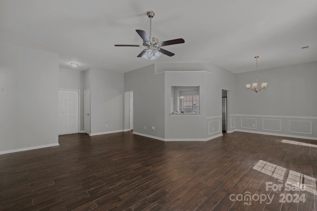 empty room featuring hardwood / wood-style floors and ceiling fan with notable chandelier