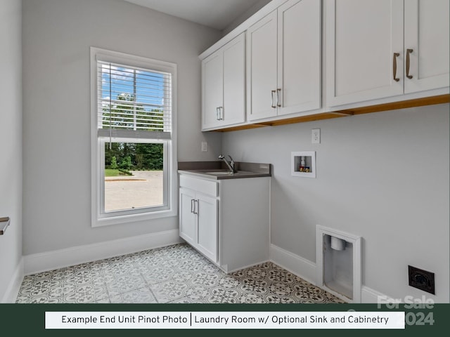 laundry room featuring light tile patterned floors, sink, cabinets, hookup for a washing machine, and electric dryer hookup