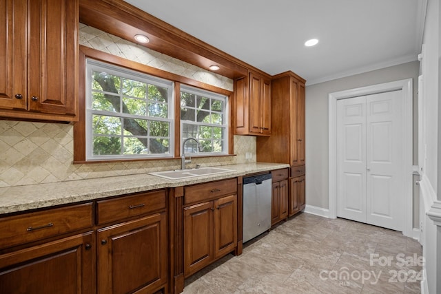 kitchen featuring light tile patterned floors, light stone countertops, sink, tasteful backsplash, and stainless steel dishwasher