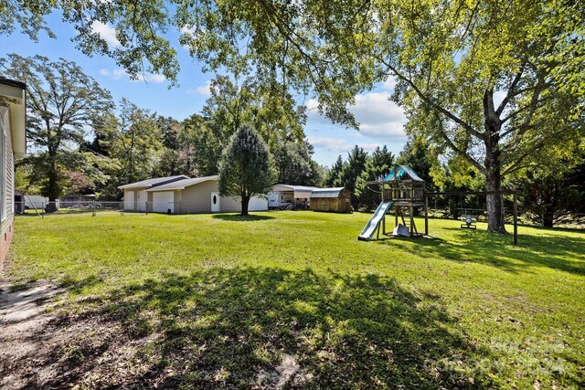 view of yard featuring a playground