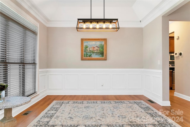 unfurnished dining area featuring visible vents and light wood-style floors