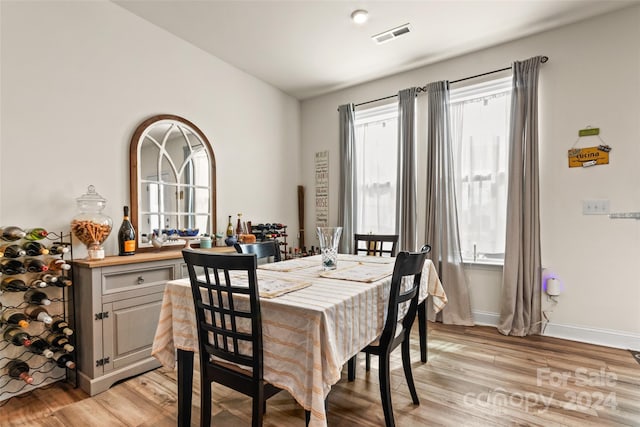 dining space featuring light hardwood / wood-style flooring