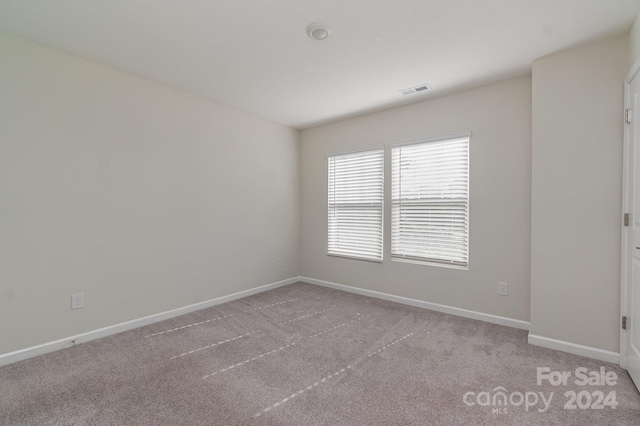 empty room featuring carpet