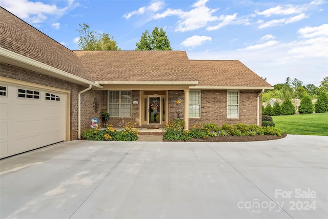 ranch-style home with a garage