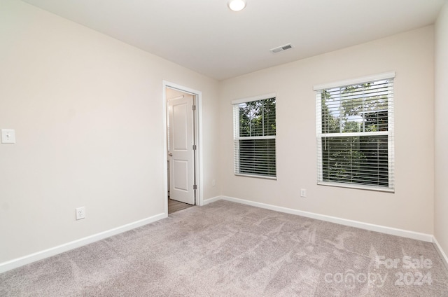 view of carpeted spare room