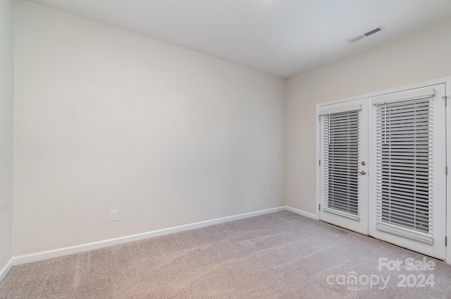 unfurnished bedroom with carpet