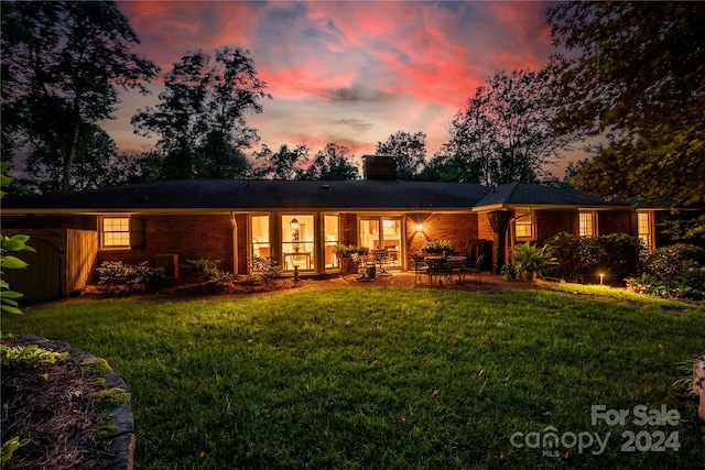 exterior space featuring a lawn