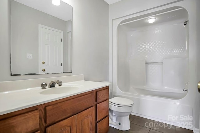 full bath with toilet, tile patterned flooring, shower / bathing tub combination, and vanity