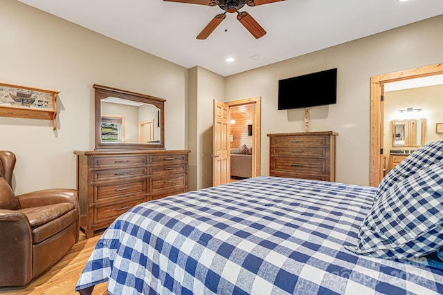 bedroom featuring ceiling fan and light hardwood / wood-style flooring