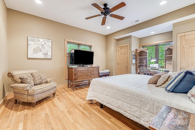 bedroom featuring ceiling fan and light wood-type flooring