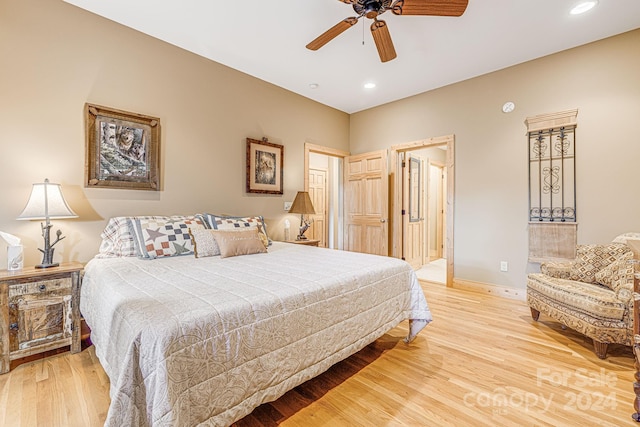 bedroom featuring ceiling fan and light hardwood / wood-style floors