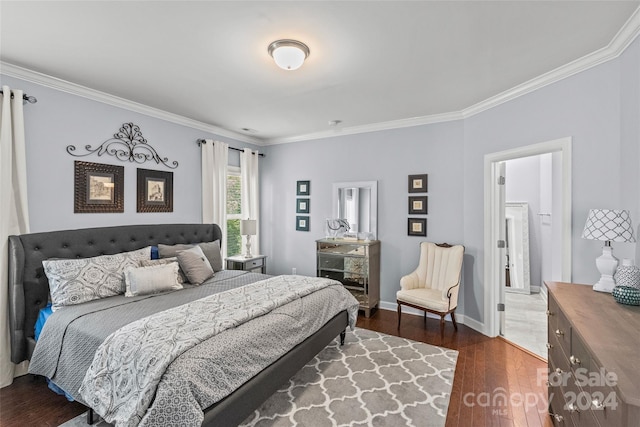 bedroom featuring dark hardwood / wood-style floors and ornamental molding