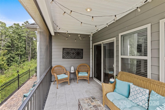 view of patio / terrace featuring a balcony