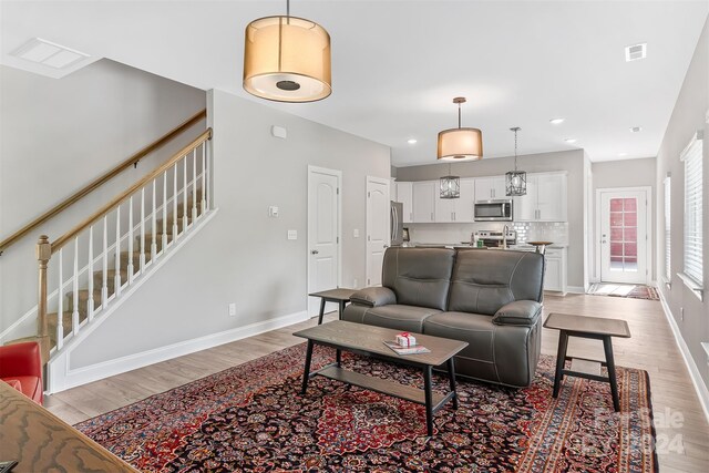 living room with hardwood / wood-style floors