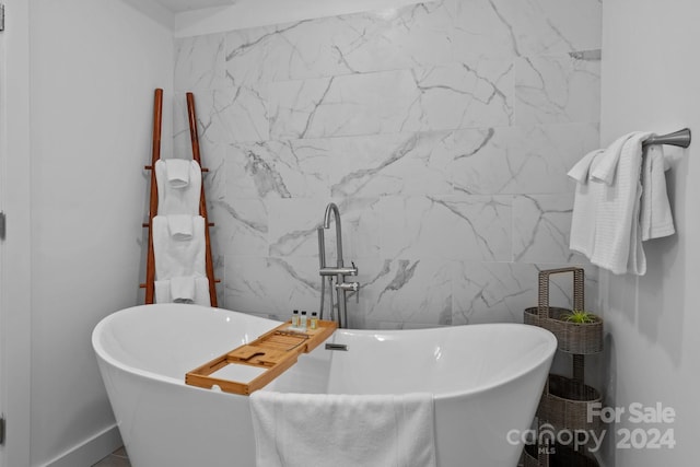 bathroom featuring a freestanding tub