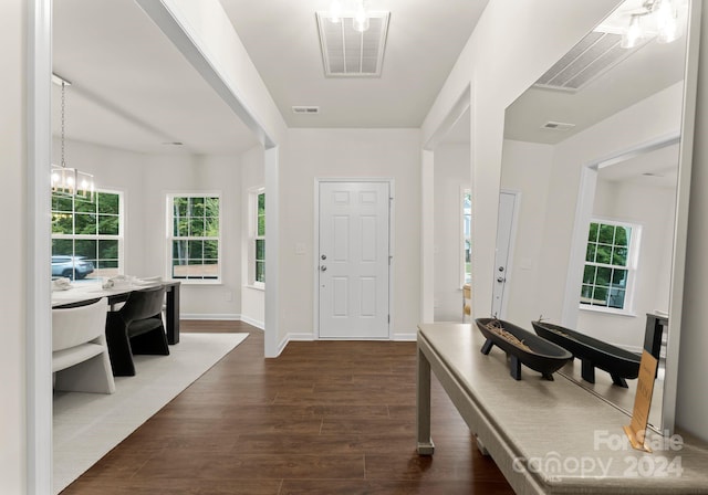 6034 Jepson Ct, Charlotte, NC 28214 - entryway with dark wood-type flooring, baseboards, and visible vents