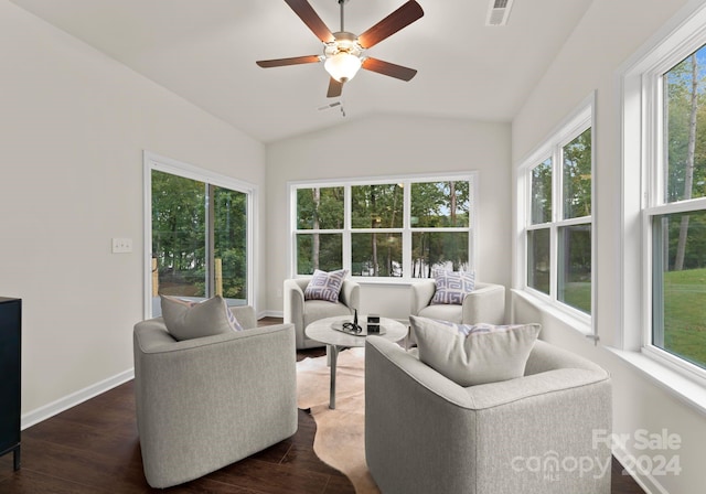 6034 Jepson Ct, Charlotte, NC 28214 - living room featuring dark wood finished floors, visible vents, a ceiling fan, and vaulted ceiling