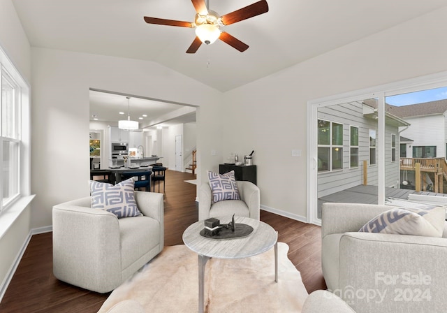 6034 Jepson Ct, Charlotte, NC 28214 - living room featuring vaulted ceiling, plenty of natural light, ceiling fan, and wood finished floors